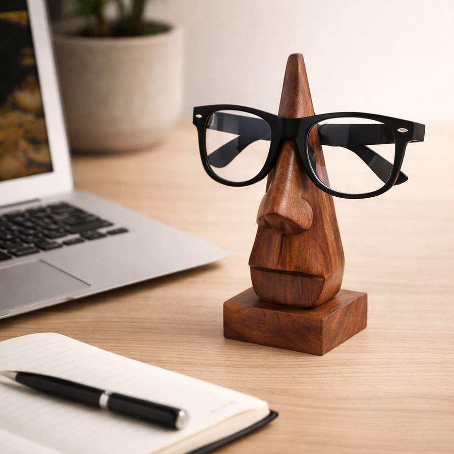 Parke on a work desk next to a laptop